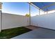 Private backyard with artificial turf and patio at 4411 N 40Th St # 52, Phoenix, AZ 85018