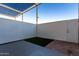 Private patio with artificial turf and brick pavers at 4411 N 40Th St # 52, Phoenix, AZ 85018