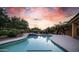 Inviting pool and spa with a stunning sunset view at 4417 E Rancho Caliente Dr, Cave Creek, AZ 85331