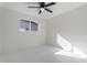 Bedroom with ceiling fan and window at 4437 N Granite Reef Rd, Scottsdale, AZ 85251