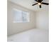 Bedroom with ceiling fan and window with blinds at 4437 N Granite Reef Rd, Scottsdale, AZ 85251