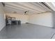 Spacious garage with epoxy flooring and abundant storage at 4437 N Granite Reef Rd, Scottsdale, AZ 85251