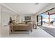 Bright living room with large sliding glass doors opening to a patio at 4437 N Granite Reef Rd, Scottsdale, AZ 85251