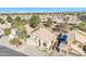 Scenic aerial view of a home in a vibrant community with lush greenery and desert landscaping at 4968 E Grandview Rd, Scottsdale, AZ 85254