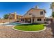 Backyard oasis with a sparkling pool and putting green at 4968 E Grandview Rd, Scottsdale, AZ 85254