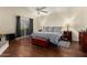 Main bedroom with wood flooring and fireplace at 4968 E Grandview Rd, Scottsdale, AZ 85254