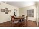 Dining room with hardwood floors and traditional furniture at 4968 E Grandview Rd, Scottsdale, AZ 85254