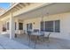 Covered patio with outdoor seating creates the perfect entertainment space at 4968 E Grandview Rd, Scottsdale, AZ 85254