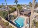 Aerial view showing a kidney-shaped pool and surrounding landscape at 5109 E Blanche Dr, Scottsdale, AZ 85254