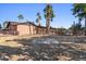 Large backyard with flagstone patio and mature trees at 5109 E Blanche Dr, Scottsdale, AZ 85254