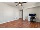 Bright bedroom with wood flooring and home office space at 5109 E Blanche Dr, Scottsdale, AZ 85254