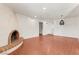 Living room with fireplace and tile floors at 5109 E Blanche Dr, Scottsdale, AZ 85254