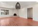 Living room featuring a fireplace and tile floors at 5109 E Blanche Dr, Scottsdale, AZ 85254