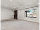 Bright living room with a large window and ceiling fan at 5109 E Blanche Dr, Scottsdale, AZ 85254