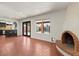 Living area with kitchen, fireplace and access to the pool at 5109 E Blanche Dr, Scottsdale, AZ 85254