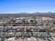 Aerial view of neighborhood, showing homes and mountain views at 5109 E Blanche Dr, Scottsdale, AZ 85254