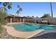 Relaxing kidney-shaped pool in sunny backyard at 5109 E Blanche Dr, Scottsdale, AZ 85254