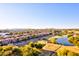 Aerial view showing community, golf course, and mountains at 5122 E Shea Blvd # 1029, Scottsdale, AZ 85254