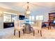 Bright dining area with a glass-top table and chairs at 5122 E Shea Blvd # 1029, Scottsdale, AZ 85254