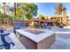 Community fire pit with seating for relaxing evenings at 5122 E Shea Blvd # 1029, Scottsdale, AZ 85254