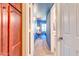 Hallway with blue walls and access to bedroom at 5122 E Shea Blvd # 1029, Scottsdale, AZ 85254