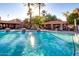 Inviting community pool with lounge chairs and BBQ area at 5122 E Shea Blvd # 1029, Scottsdale, AZ 85254