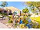 Landscaped courtyard with a pond and lush greenery at 5122 E Shea Blvd # 1029, Scottsdale, AZ 85254