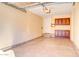 Attached garage with built-in cabinets and epoxy flooring at 5122 E Shea Blvd # 1030, Scottsdale, AZ 85254