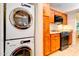 Stackable washer and dryer in a convenient kitchen alcove at 5122 E Shea Blvd # 1030, Scottsdale, AZ 85254