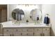 Double vanity bathroom with updated fixtures and walk-in shower at 5505 E Mclellan Rd # 99, Mesa, AZ 85205