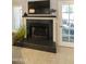 Modern fireplace with a sleek black tile surround at 5505 E Mclellan Rd # 99, Mesa, AZ 85205