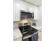 Modern kitchen features stainless steel appliances and white shaker cabinets at 5505 E Mclellan Rd # 99, Mesa, AZ 85205