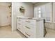 Laundry room with white shaker cabinets and marble countertop at 5505 E Mclellan Rd # 99, Mesa, AZ 85205