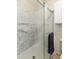 Walk-in shower with marble surround and grab bars at 5505 E Mclellan Rd # 99, Mesa, AZ 85205