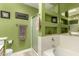 Bathroom features a shower, bathtub, and built-in shelves at 553 S Meadows Dr, Chandler, AZ 85224