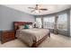 Bright bedroom with bay window and ceiling fan at 553 S Meadows Dr, Chandler, AZ 85224