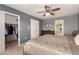 Bedroom with a walk-in closet and en-suite bathroom at 553 S Meadows Dr, Chandler, AZ 85224