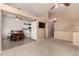 Open dining area with kitchen view and wood table at 553 S Meadows Dr, Chandler, AZ 85224