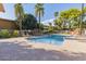 Inviting community pool with lounge chairs at 6125 E Indian School Rd # 180, Scottsdale, AZ 85251