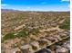 Aerial view of community, showcasing homes and golf course at 6358 E Evening Glow Dr, Scottsdale, AZ 85266