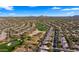 Aerial view of community with golf course and mountain views at 6358 E Evening Glow Dr, Scottsdale, AZ 85266