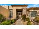 Front entry with security door and terracotta tile flooring at 6358 E Evening Glow Dr, Scottsdale, AZ 85266