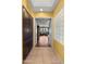 Hallway with tile flooring, leading to a living area at 6358 E Evening Glow Dr, Scottsdale, AZ 85266