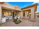 Relaxing covered patio with comfortable seating and desert landscaping at 6358 E Evening Glow Dr, Scottsdale, AZ 85266