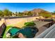 Relaxing backyard oasis with a pool and shaded pergola at 6414 W Villa Linda Dr, Glendale, AZ 85310