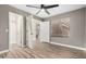 Spacious bedroom with mirrored closet doors and neutral walls at 6414 W Villa Linda Dr, Glendale, AZ 85310