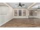 Bright and airy living room with hardwood floors and lots of windows at 6414 W Villa Linda Dr, Glendale, AZ 85310