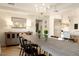 Spacious dining room with a large table and chandelier at 6740 N 7Th St, Phoenix, AZ 85014