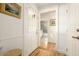 Bright entryway with white wainscoting and hardwood floors at 6740 N 7Th St, Phoenix, AZ 85014