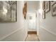 Bright hallway with white walls and wood floors at 6740 N 7Th St, Phoenix, AZ 85014